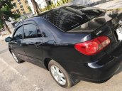 Bán Toyota Corolla altis G đời 2005, màu đen số sàn, giá chỉ 345 triệu