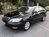 Cần bán xe Toyota Camry đời 2004, màu đen