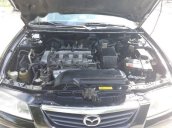 Bán ô tô Mazda 626 đời 2001, màu đen chính chủ