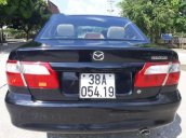 Bán ô tô Mazda 626 đời 2001, màu đen chính chủ