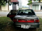 Gia đình bán Mazda 323 đời 1996, màu xám