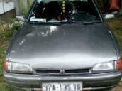 Gia đình bán Mazda 323 đời 1996, màu xám