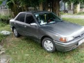 Gia đình bán Mazda 323 đời 1996, màu xám