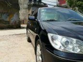 Bán Toyota Camry 3.0 2004, màu đen 