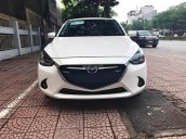 Cần bán lại xe Mazda 2 1.5 AT đời 2015, màu trắng giá cạnh tranh