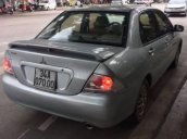 Gia đình bán xe Mitsubishi Lancer đời 2003, màu bạc