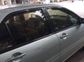 Gia đình bán xe Mitsubishi Lancer đời 2003, màu bạc