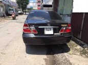 Cần bán xe Toyota Camry 2.4G đời 2004, màu đen, 385 triệu