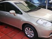 Chính chủ bán Nissan Tiida AT đời 2007, màu vàng, nhập khẩu