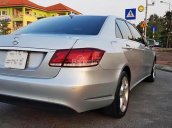 Cần bán Mercedes E200 đời 2014, màu bạc