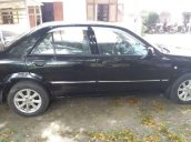 Bán xe Ford Laser đời 2003, màu đen