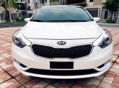 Cần bán lại xe Kia K3 AT đời 2014, màu trắng số tự động, 565 triệu