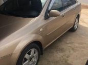 Bán xe Daewoo Lacetti đời 2004, màu vàng