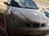 Bán xe Daewoo Lacetti đời 2004, màu vàng