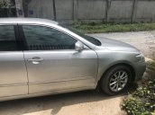 Cần bán xe Toyota Camry 2.4G đời 2010, màu bạc, xe gia đình, giá 690tr