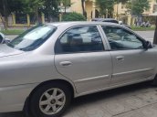 Cần bán gấp Kia Spectra 1.6 MT đời 2004, màu bạc