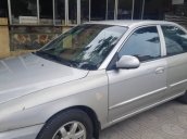 Cần bán gấp Kia Spectra 1.6 MT đời 2004, màu bạc