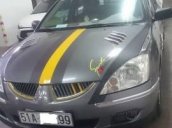 Cần bán xe Mitsubishi Lancer đời 2004, màu xám chính chủ