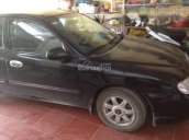 Bán xe Kia Spectra đời 2004, màu đen, nhập khẩu nguyên chiếc 130tr