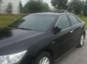 Bán Toyota Camry 2.0E năm 2013, màu đen  