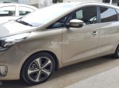 Bán Kia Rondo GAT 2.0AT màu vàng cát số tự động 7 chỗ biển Sài Gòn 2015