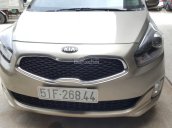 Bán Kia Rondo GAT 2.0AT màu vàng cát số tự động 7 chỗ biển Sài Gòn 2015