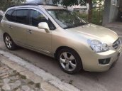 Cần bán gấp Kia Carens 2.0AT đời 2010, màu vàng xe gia đình, giá 335tr