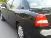 Cần bán gấp Daewoo Nubira sản xuât 2002, màu đen chính chủ, giá 95tr