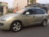 Cần bán gấp Kia Carens 2.0AT đời 2010, màu vàng xe gia đình, giá 335tr