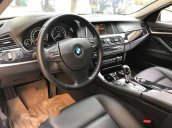 Cần bán xe BMW 5 Series 520i đời 2014, màu trắng chính chủ