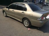 Bán ô tô Mitsubishi Lancer năm 2005, màu vàng 