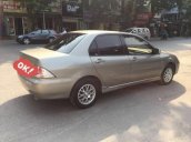 Bán ô tô Mitsubishi Lancer năm 2005, màu vàng 