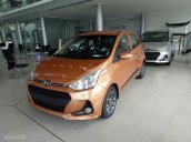 Bán Hyundai Grand i10 1.2MT Base màu cam 2018, mới 100%, hỗ trợ trả góp đến 85% giá trị xe, hotline tư vấn: 0941.46.22.77