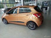 Bán xe Hyundai Grand i10 1.0AT bản gia đình đời 2017, màu cam, hỗ trợ trả góp đến 85% xe. Hotline: 0941.46.22.77