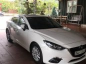 Cần bán lại xe Mazda 3 đời 2015, màu trắng xe gia đình