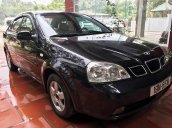 Bán xe Daewoo Lacetti năm 2004, màu đen, giá 165tr