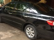 Cần bán xe Toyota Corolla Altis 1.8 MT đời 2011, màu đen