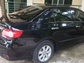 Cần bán xe Toyota Corolla Altis 1.8 MT đời 2011, màu đen