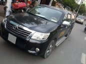 Bán ô tô Toyota Hilux 2.5E MT đời 2013, màu đen như mới