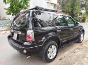 Bán ô tô Ford Escape 2.3 AT đời 2005, màu đen