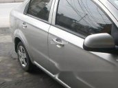 Cần bán Chevrolet Aveo MT đời 2011, màu bạc