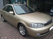 Bán ô tô Ford Laser 1.8MT năm 2003, màu vàng cát, giá chỉ 195 triệu