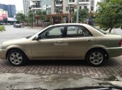 Bán ô tô Ford Laser 1.8MT năm 2003, màu vàng cát, giá chỉ 195 triệu