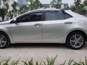 Bán gấp Toyota Corolla altis 1.8 sản xuất 2015, màu bạc