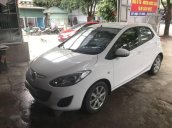 Cần bán gấp Mazda 2 đời 2015, màu trắng đã đi 23000km