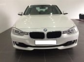 Bán xe BMW 320i đăng kí 2014, màu trắng, chính chủ, được bảo dưỡng định kì tại hãng