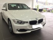 Bán xe BMW 320i đăng kí 2014, màu trắng, chính chủ, được bảo dưỡng định kì tại hãng