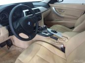 Bán xe BMW 320i đăng kí 2014, màu trắng, chính chủ, được bảo dưỡng định kì tại hãng