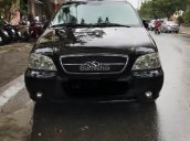 Bán ô tô Kia Carnival GS 2.5 AT đời 2009, màu đen xe gia đình