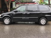 Bán ô tô Kia Carnival GS 2.5 AT đời 2009, màu đen xe gia đình